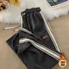 Calça de Veludo Cotelê Masculina Primavera e Outono Marca Americana de Moda Calça Esportiva Listrada Calça Masculina Solta Casual Calça Reta