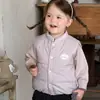 Nuevo Chaleco de Plumón para Bebé con Dibujo de Gato 2026 Otoño/Invierno Chaleco de Cuello Alto para Niñas Conjunto Cálido de Tres Piezas