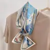 Lenço de seda pequeno para primavera e verão feminino estilo coreano longo versátil decorativo quente de seda floral lenço de presente fabricantes de lenços