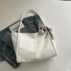 Bolsa Grande de Grande Capacidade Estilo Relaxado para Mulheres 2026 Nova Bolsa Tote Retro de Verão para o Trabalho Bolsa de Ombro Simples Versátil