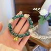 Templo mismo estilo recuerdo turístico pulsera de esmalte color gris fragante colección pulsera de bestia dorada estilo étnico retro artístico para mujeres