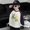 Elegante camiseta de manga larga para niños, colección de otoño 2026, nuevo diseño con mangas raglán, top versátil como capa base para bebés