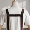 Delantal moderno impermeable y a prueba de aceite de PU lavable para cocina casera, delantal de cocina modelo nuevo, ropa de trabajo especializada para catering con texto impreso