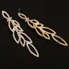 Nuevos Pendientes Creativos Cadena de Garras Europeos y Americanos Pendientes de Pedrería Brillantes Pendientes de Año Nuevo para Escenario Venta al por Mayor E368