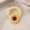 Grampo de Girassol de Zhao Rusi Clipe Lateral Franja Grampo de Cabelo Quebrado Grampo de Cabelo de Flor Celebrante da Internet Novo Chapéu de Girassol