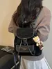 Mochila nueva de gran capacidad Yuezhi 2026 principios de otoño, moderna y versátil, bolso tipo cubo casual con cordón, mochila de viaje