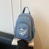 Mochila de grande capacidade, modelo novo 2026, transfronteiriça, casual e estilosa para o dia a dia, bolsa transversal de ombro único em jeans, simples e moderna.