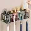 Portacepillos de dientes sin taladro, vaso para cepillos de dientes, estante integrado de almacenamiento montado en la pared, portacepillos de dientes para lavabo de baño, soporte para cepillos de dientes
