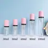 Botella de espuma transparente para mascotas con 30 dientes, 30 ml y 100 ml, limpiador facial, champú y espuma, lista para la venta.