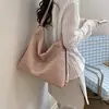 Bolsa transfronteriza 2026 primavera nuevo bolso de hombro tejido para mujer, mochila multifuncional de alta gama, moderno y versátil para ir al trabajo