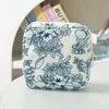 Bolsa de Armazenamento de Absorventes de Veludo Transfronteiriça Nova Bolsa de Armazenamento de Absorventes Florais Portátil Bolsa Menstrual de Grande Capacidade