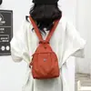 Mini Mochila 2025 Nueva Simple Versátil Antirrobo Bolso de Pecho para Mujer Moda Tela Oxford Casual Mochila Pequeña