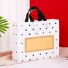 Linda bolsa de tienda de ropa con cara sonriente, bolsa de regalo, tienda de ropa para niños y niñas, bolsa de plástico portátil, embalaje de caja de zapatos, logotipo al por mayor