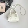 Bolsa Feminina Estilosa Texturizada de Ombro Cruzado Concha Casual Retro Minimalista Tendência Nova Moda Primavera 2026