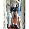 Shorts de mezclilla estilo americano línea A para mujer, verano 2026, nuevo diseño para figuras petite, adelgazantes, elásticos, con dobladillos enrollados, hot pants para uso al aire libre