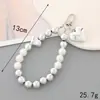 Ins Nuevo Colgante de Llavero con Lentejuelas y Lazo de Perlas para Funda de Teléfono Móvil Accesorios de Correa de Muñeca para Lanyard de Teléfono Móvil
