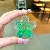 Nuevas cuentas de burbujas luminosas de aceite acrílico botella de arena movediza de flor de cerezo adornos de flores creativos colgante de bolsa al por mayor