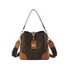 Bolso cubo retro de moda transfronterizo para mujer, nueva colección 2026, alta gama, nicho, lujo ligero, bolso de hombro y bolso cruzado versátil