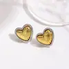 Pendientes de botón de corazón bitono con baño de cobre, estilo minimalista europeo y americano, con sentido del diseño, Pendientes de corazón a rayas de moda y sencillos