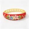 En stock directo del fabricante Pulsera azul Jingtai flores de colores esmaltadas incrustadas con pedrería anillo de mano hueco estilo chino étnico al por mayor