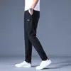 Pantalones Casuales Finos de Verano para Hombre 2026 Seda Helada Cintura Elástica Rectos Sueltos Elásticos Largos Transpirables de Secado Rápido
