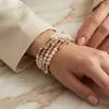 Pulsera de Perlas de Múltiples Capas Enroscadas Estilo Nuevo Moda Europea y Americana, Diseño de Lujo Ligero Transfronterizo con Diamantes Incrustados en Cobre