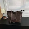 Bolso de gran capacidad para mujer para desplazamientos casuales transfronterizos, nuevo bolso de hombro de moda 2026, bolsa tote de alta gama para estudiantes universitarios