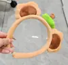 Faixa de cabeça de pelúcia divertida e peculiar para mulheres, com design de desenho animado, textura fofa e estilo de coroa alta, perfeita para lavar o rosto e adicionar um toque de sofisticação aos seus acessórios de cabelo.