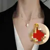 Celebridad de Internet Guanhe Oro Diamante Completo Trébol de Cuatro Hojas Collar para Mujer Chapado en Oro de 18K Elegante a la Moda Sin Decoloración Joyería Simple y Elegante