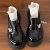 Mocasines de Cuero Suave con Mariposa de Metal y Suela Gruesa para Mujer 2026 Primavera Nuevo Estilo Británico Tacón Grueso Planos Moda Zapatos de Mujer
