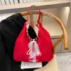 Estilo coreano retro bolsa de gran capacidad para mujer bolsa de lona bordada estilo Ins simple con letras para ropa de trabajo bolsa de hombro versátil