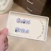 Uñas postizas hechas a mano estilo ojo de gato en morado, con un acabado de alta gama, estilo caricatura, adecuadas para estudiantes, lindas y sencillas, con un diseño de cielo ahumado que hace que la piel luzca más clara