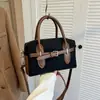Bolso de gamuza para mujer, nuevo modelo de otoño 2026, bolso de mano vintage de alta gama para el día a día, exquisito bolso de hombro y cruzado