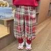 Pantalones de cuadros para niña con forro polar 2026 Nuevo estilo Moda infantil Elegantes para niña Pantalones casuales engrosados Estilo Otoño/Invierno