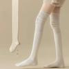 Calcetines de mujer otoño e invierno Nuevos Calcetines altos color sólido Costura japonesa Calcetines por encima de la rodilla Calcetines de rizo casuales que combinan con todo Venta al por mayor de fábrica
