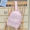 Mochila de alto valor para estudiantes de secundaria de nicho mochila pequeña estampado estilo Mori estrella linda mochila ligera