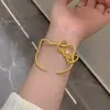 "Kitty" Pulseira Aberta com Laço Dourado para Mulheres, Estilo Menina, Joia de Temperamento de Luxo Leve de Nicho, Pulseira de Menina