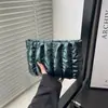 Bolso de Cosméticos con Pliegues de Moda 2026 Estilo Nuevo de Primavera Bolso Sencillo de Textura Nicho Bolso de Mano Casual Estilo Coreano para Mujer