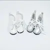 Botas para muñeca de 12 pulgadas zapatos de cuero con cordones botas de moda 6 Zapatos para muñeca BJD accesorios para juguetes fabricantes venta al por mayor