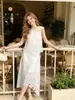 Conjunto de Dos Piezas de Encaje Soluble en Agua Estilo Francés Verano 2026 para Mujer, Top sin Mangas Calado y Falda Midi Irregular