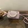 Bolsa de Hombro Casual de Aspecto Elegante Estilo Nuevo Primavera 2026 Bolso de Mano Bolso de Noche Perla Simple Moda Bolso Cruzado para Mujer