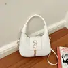 Bolsa de outono moderna e estilosa para mulheres, apresentando um novo design com uma textura única, perfeita para o uso diário e oferecendo uma opção de bolsa de ombro chique e versátil.