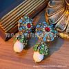 Pendientes de gemas retro de alta calidad con diamantes, estilo antiguo medio de Qingdao, con borlas de aleación y nicho occidental.