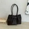 Bolsa de ombro grande de tecido à mão transfronteiriça para mulheres, nova moda de nicho 2026, simples para o dia a dia