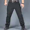 Pantalones tácticos transfronterizos para hombre, pantalones de camuflaje para primavera y verano, pantalones de trabajo, pantalones para exteriores con múltiples bolsillos, resistentes al desgaste, pantalones de trabajo IX7, venta al por mayor de comercio exterior