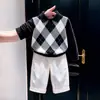 Estilo Coreano Meninos 2026 Outono Nova Chegada Preto Clássico Padrão Diamante Gola Polo Suéter de Malha Calça Branca Larga Infantil