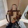 Bolsas Populares de Este Año para Mujer 2026 Nuevo Estilo Bolso Cruzado Tipo Cubo Bolso de Mano de Alta Gama Bolso de Hombro