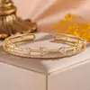 RAKOL Moda Luxo Leve Cobre Incrustado Zircônia Trevo de Quatro Folhas Aberto Ajustável Pulseira Feminina Nicho Toque de Alto Padrão Joia de Mão