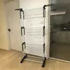 Toallero transfronterizo tendedero plegable de pie tipo ala estante de almacenamiento multifuncional tendedero móvil de varias capas dormitorio