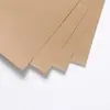 Directo de fábrica papel Kraft 60g papel Kraft amarillo claro papel de envolver papel intermedio cubierta de papel cartón duro al por mayor